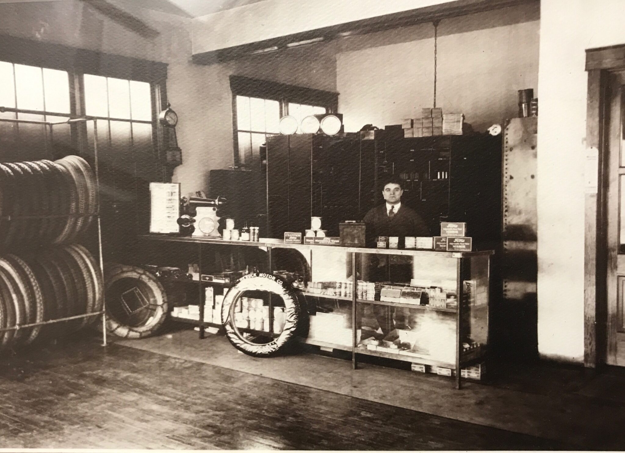 Irvin Crissinger at his Ford dealership, Crissinger Motors, opened in 1923